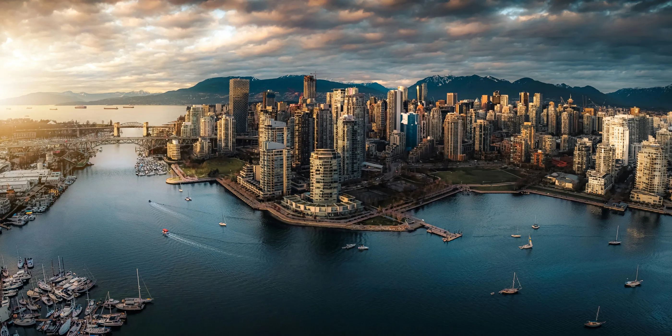 Downtown Vancouver, False Creek, and the North Shore mountains at sunset